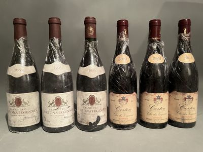 six bottles of wine are lined up in a row on a table