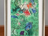 painting on a wooden easel with a picture of a cat and a bird