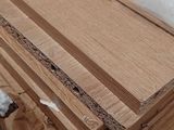 several pieces of wood are stacked on top of each other