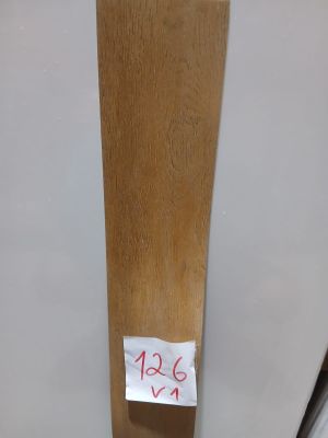 a piece of wood that has a sticker on it