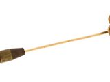 a wooden stick with a flower on top of it