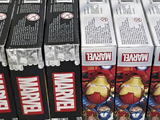 several boxes of marvel comics are stacked on top of each other