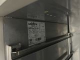 a close up of a stainless steel oven with a label on it