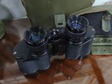 a pair of binoculars sitting on top of a table