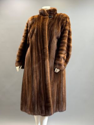 a brown fur coat on a mannequin mannequin mannequin mannequin mannequin mannequin mannequin mannequin manne