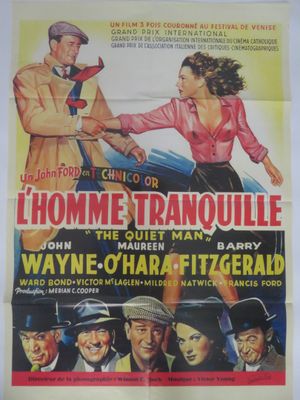 une affiche de film mettant en scène un homme et une femme se serrant la main
