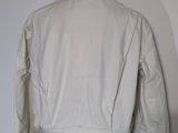 an image of a white jacket on a mannequin mannequin