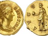 a gold coin with an image of a woman on it