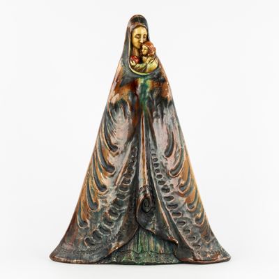 an image of a statue of a woman holding a child