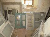 a room that has a lot of windows in it