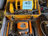 a yellow case with tools in it sitting on a table