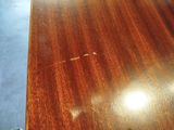 a close up of a table with a wooden top