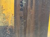 a picture of a door with a chain hanging from it