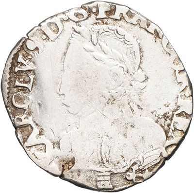 a close up of a coin on a white background