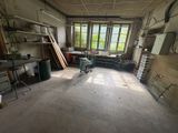 a room that has a lot of furniture in it
