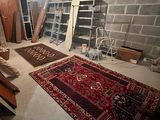 an image of a room with a lot of stuff on the floor
