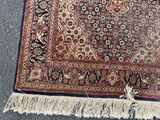 an image of a rug with a fringe on the ground