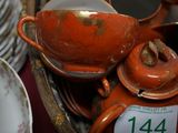 many plates and bowls that are on the table