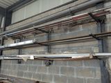 many pipes and pipes on the wall of a building