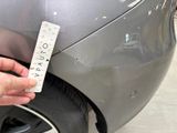 a hand that is holding a sticker that says today on it
