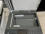 a printer that is sitting on top of a desk