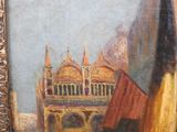an oil painting of a building with a red roof in a gold frame