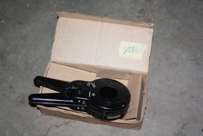a box that has a pair of scissors in it