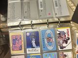 a suitcase full of cards and other items sitting on a table