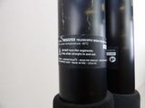 a close up of a couple of black pipes