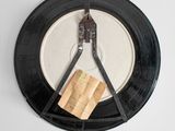 a picture of a clock that is hanging on the wall