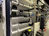 a room filled with lots of different types of shoes