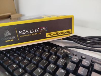 a black keyboard with a yellow box on top of it