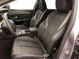 the interior of a car with black leather seats and a center console