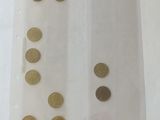 a lot of coins that are in a clear bag