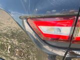 a close up of a car ' s tail lights and tail lights