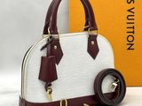 louis vuitton women ' s handbag in white and burgundy