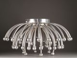 a metal object that looks like a chandelier hanging from a ceiling