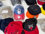 a lot of hats that are on a table