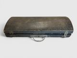 an old black suitcase with a handle on a white surface
