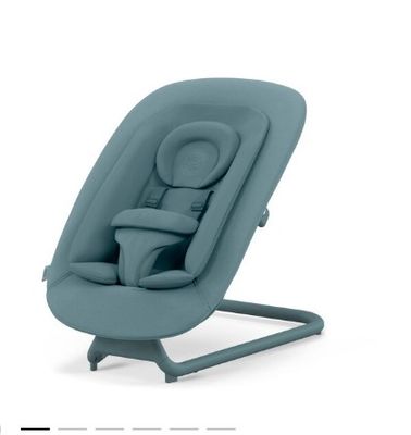 an image of a baby chair with a baby seat on it