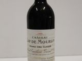 a bottle of wine that is sitting on a table