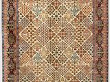 an antique persian rug with a floral design