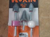 two pieces of tools are in a package on the floor