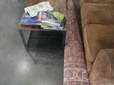 a brown couch and a coffee table in a room