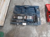 two tools that are sitting on the floor