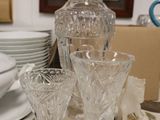a lot of glass items sitting on a table