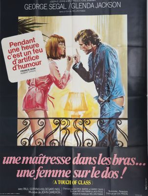 une affiche de cinéma représentant un homme et une femme sur un balcon