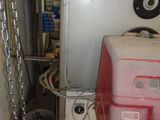 an image of a water heater in a garage