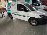 a white van that is parked in a garage