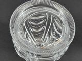 an image of a glass ashtray on a black background